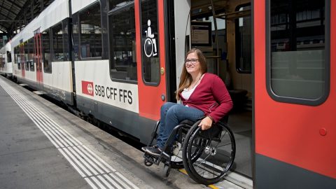 Disabled woman at Swiss station, source: SBB