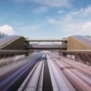 Looking down the tracks at an HS2 station CGI