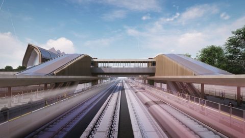 Looking down the tracks at an HS2 station CGI