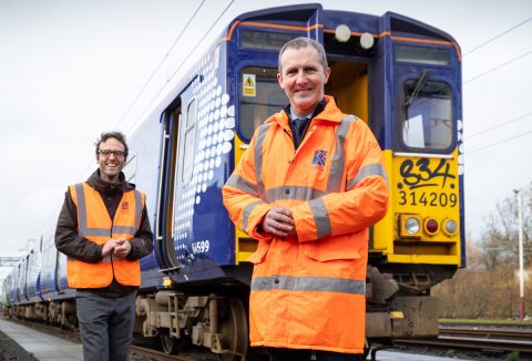 Michael Matheson MSP - Cabinet Secretary for Transport, Infrastructure and Connectivity with Dr. Ben Todd, CEO of Arcola Energy and a 314 Class electric train at the Scotrail Yoker Depot in Yoker, Glasgow with the train that will be converted to run on hydrogen.