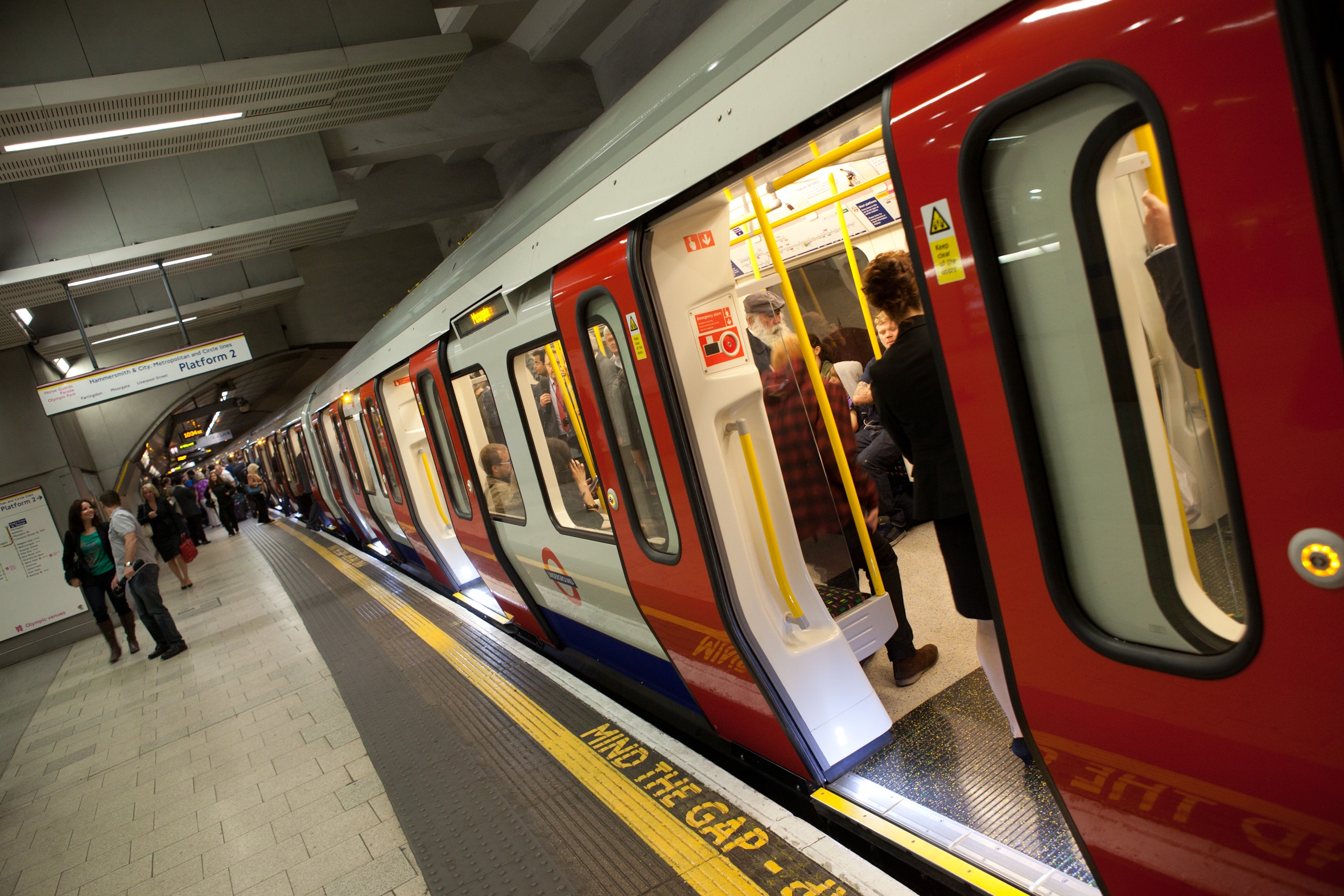 London Underground train at the platform with doors open ready to depart 