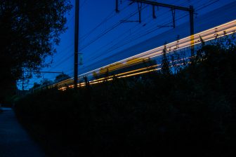 Night train speeding through countryside