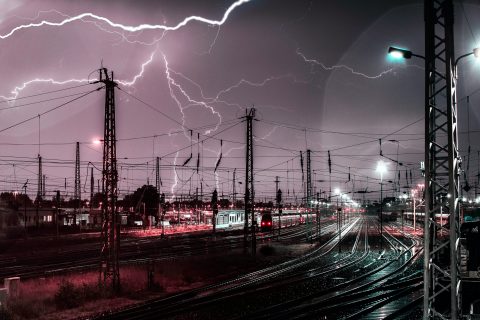 Lightning storm above railway