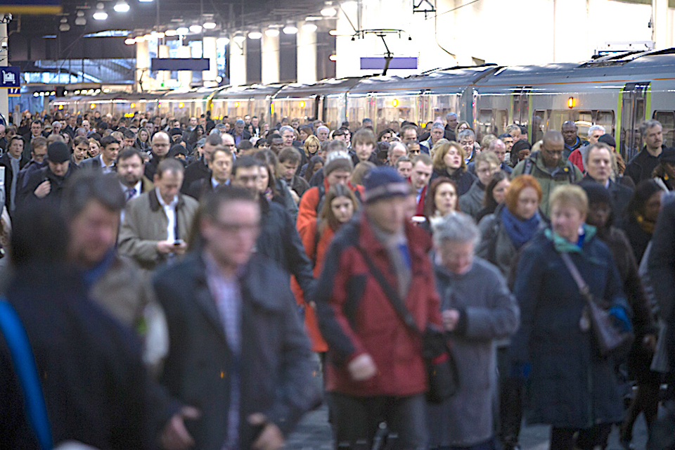 Busy commuter scene at station