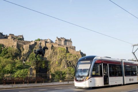 A tram passes Edinburgh Castle