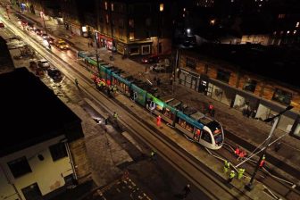 Edinburgh Tram on test run in Leith Walk, seen from a tenement window above