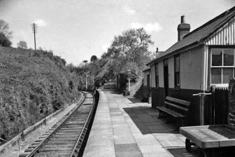 Black and white image of 1960s Bryn Teify station in Wales on a sunny day