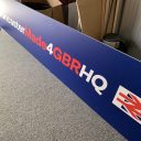 Redundant sign for Doncaster for GBR HQ lying on floor