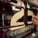 25 Years anniversary vinyls being applied int eh workshop to a Heathrow Express train
