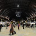 Concourse at Paddington station with a few passengers