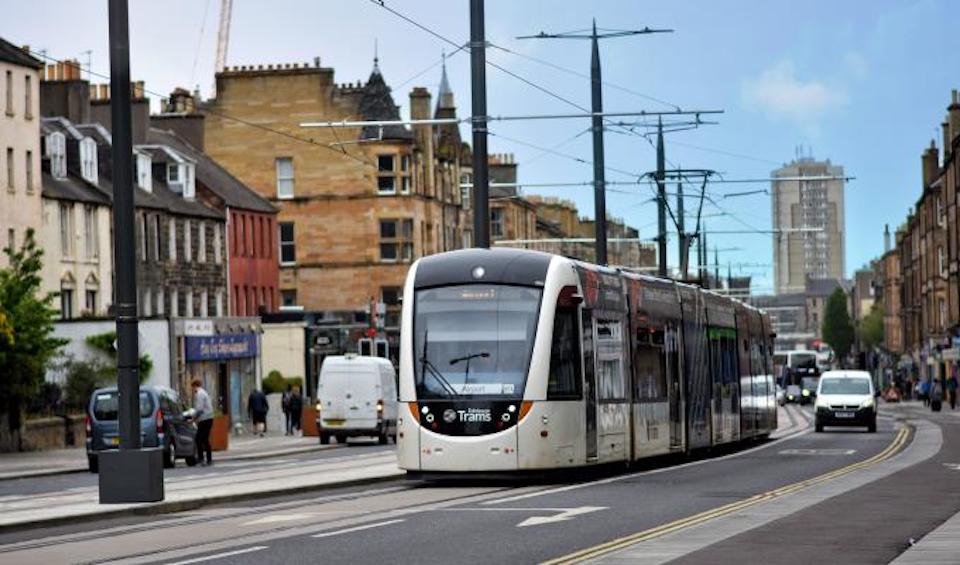 An Edinburgh tram on a daylight test of street running on Leith Walk, the boulevard that connects central Edinburgh with the Port of Leith