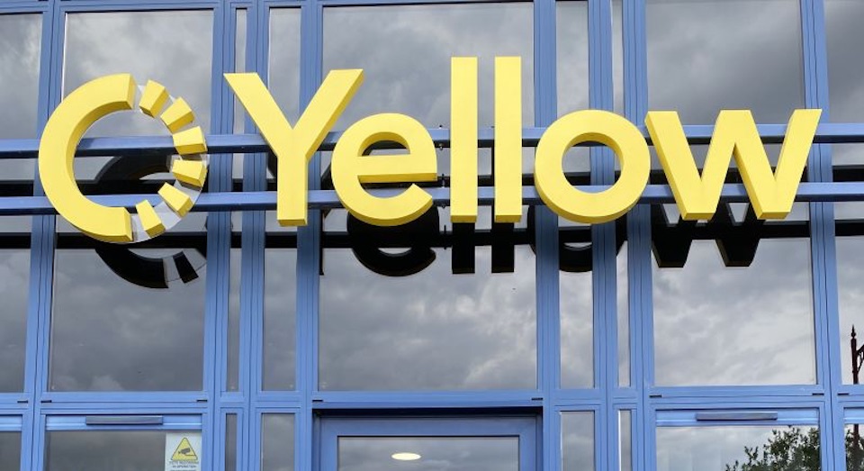 Yellow Rail headquarters logo on building in Derby