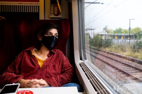 Masked passenger aboard a Thalys train (Shutterstock)