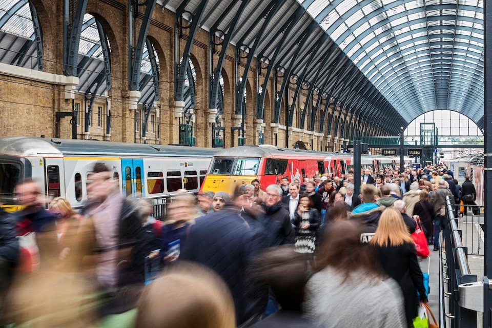 Busy platform at King's Cross station in London