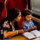 Mother and pre-school son on train