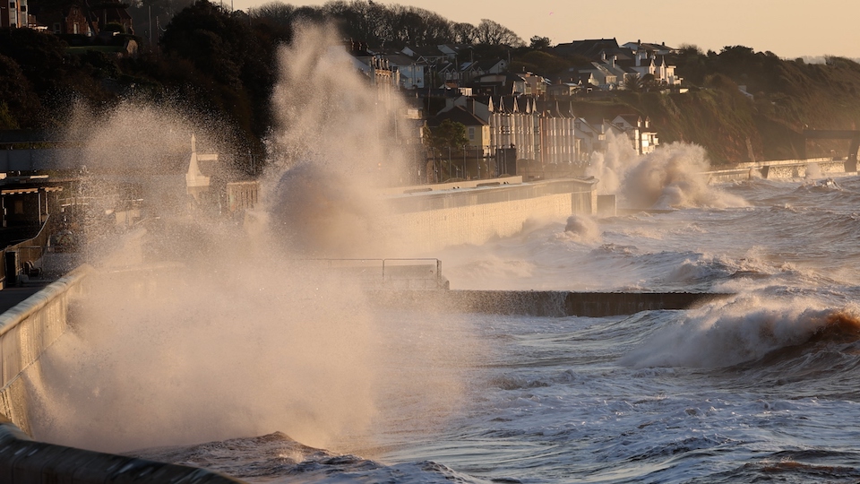 Huge wave breaks over the sea wall at Dawlish